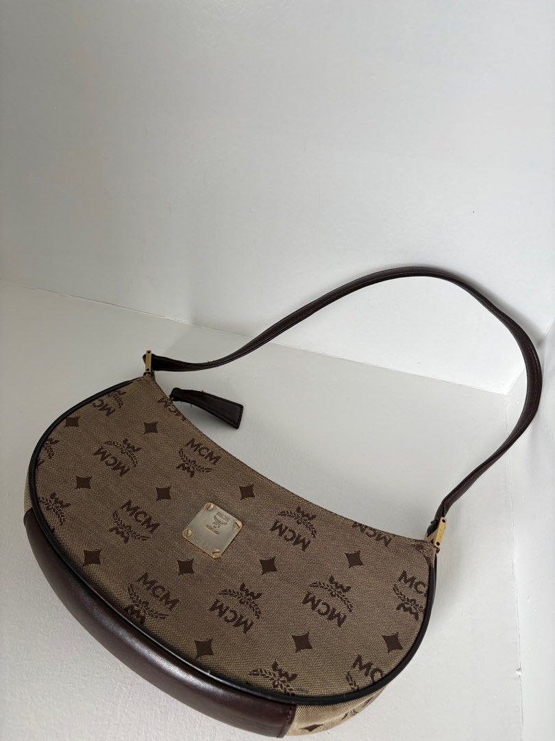 MCM baguette bag (Category: Luxury Bags & Wallets) located in Iloilo. Submitted by ashaonatelouise (Listing ID 1359423498, Image 1). Description: Authentic Turnable screws Recently cleaned No flaws.