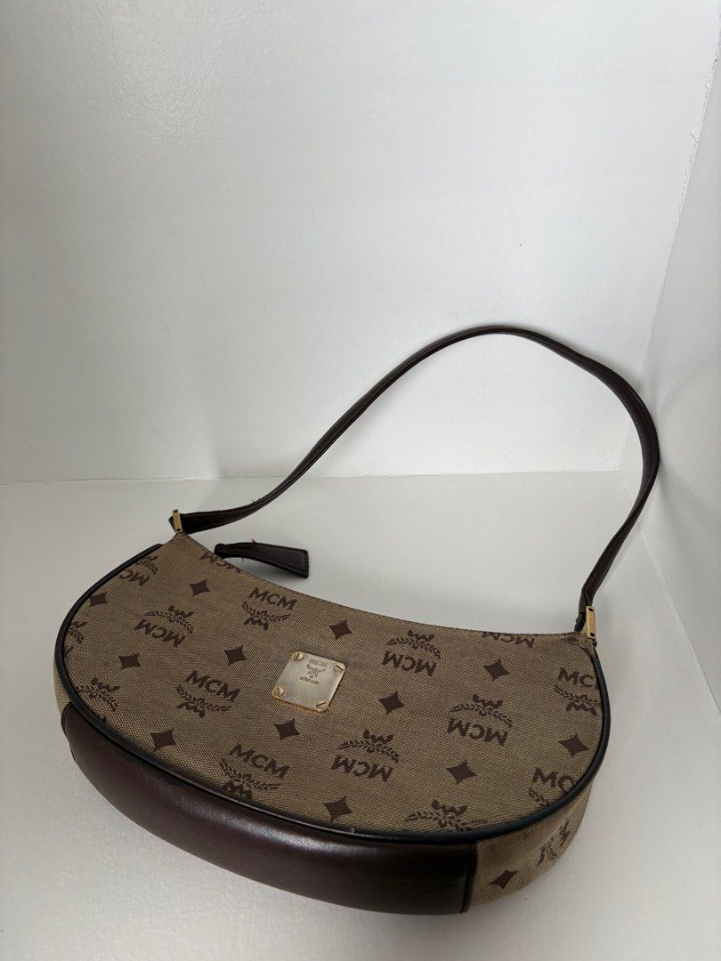 MCM baguette bag (Category: Luxury Bags & Wallets) located in Iloilo. Submitted by ashaonatelouise (Listing ID 1359423498, Image 2). Description: Authentic Turnable screws Recently cleaned No flaws.