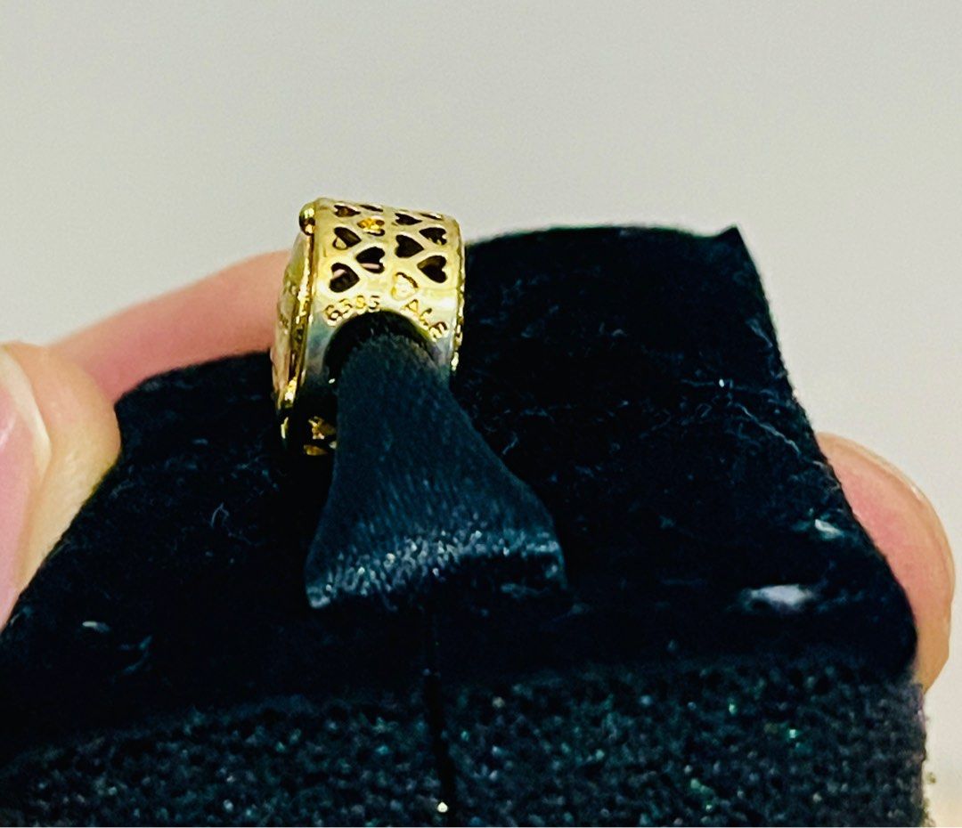 Pandora Shine Openwork Family Roots Charm (Category: Charms) located in Quezon City. Submitted by ccgem (Listing ID 1359452905, Image 3). Description: This is the last of the pair of Family Tree Roots. I had 2 in this Shine Collection. Since this was bought years ago, there is visible fading of the gold plating. But still very much presentable and good. Selling very low. Bought from Pandora Glorietta at Price ₱4550 Selling very low. Complete incl