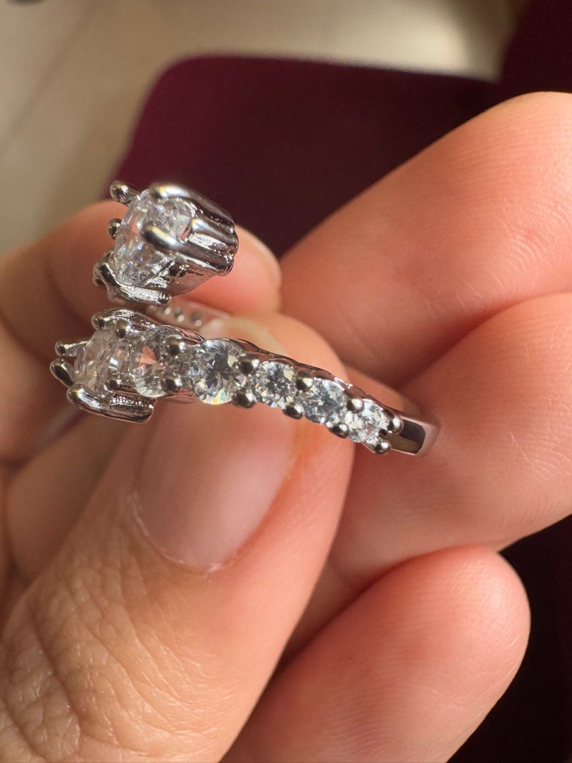 Serpentine Ring (Category: Rings) located in Cavite. Submitted by leylamm (Listing ID 1359339147, Image 3). Description: Moissanite. Free size. Bought in HK for 400HKD in 2023. Used few times only. With PT950 marking, not sure if real. No inclusion..