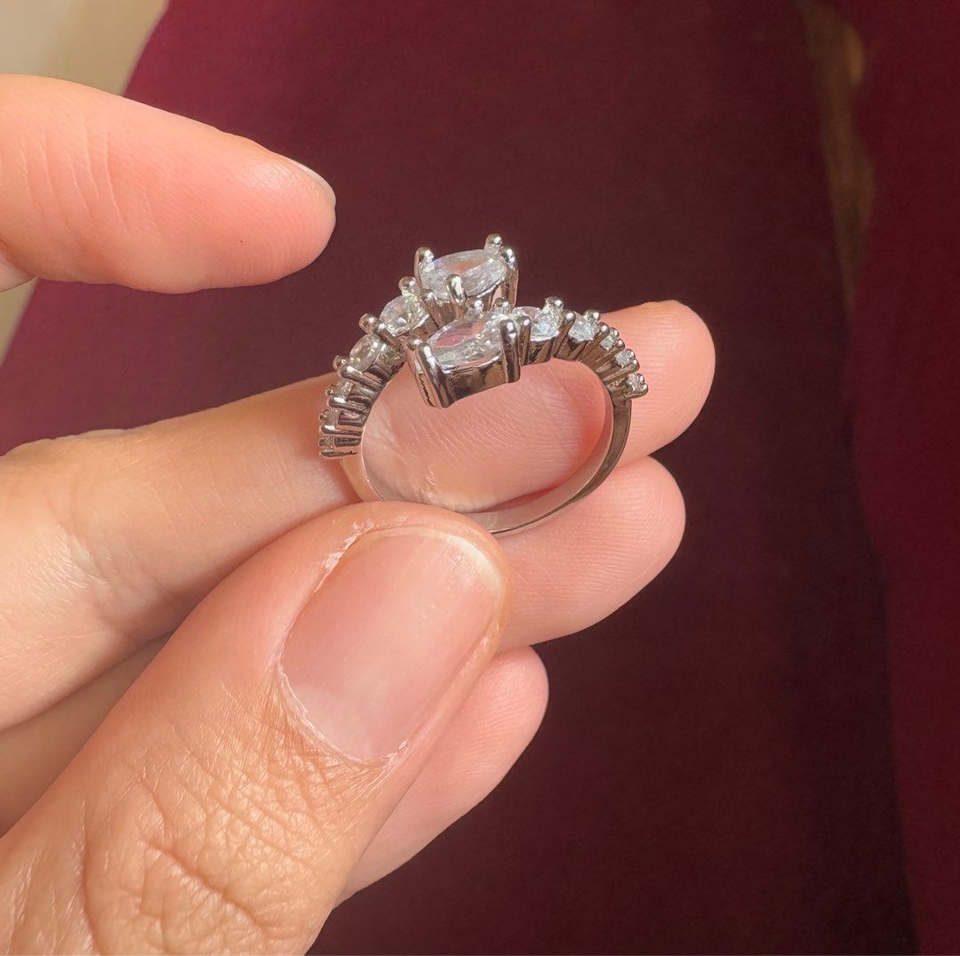 Serpentine Ring (Category: Rings) located in Cavite. Submitted by leylamm (Listing ID 1359339147, Image 1). Description: Moissanite. Free size. Bought in HK for 400HKD in 2023. Used few times only. With PT950 marking, not sure if real. No inclusion..