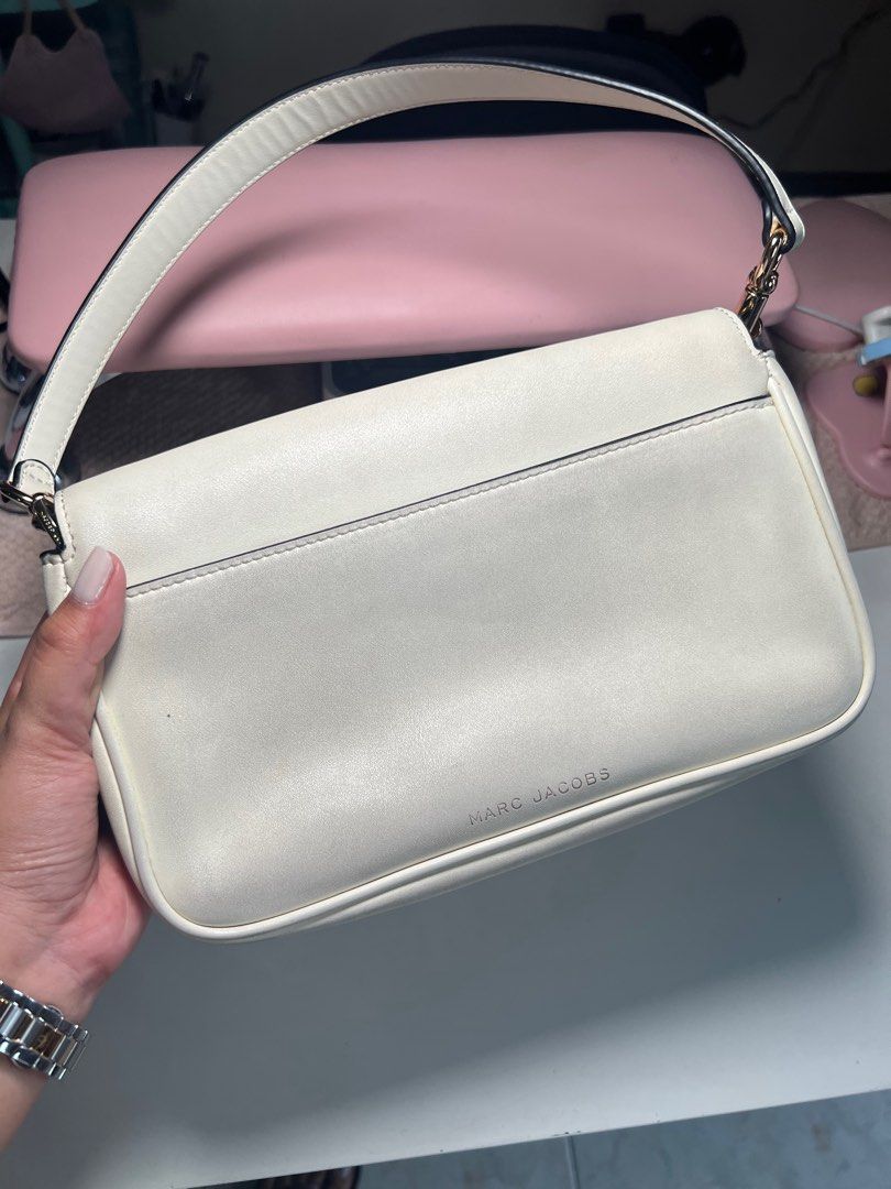 The J Marc Jacobs Mini Shoulder/ Sling Bag (Category: Luxury Bags & Wallets) located in Manila. Submitted by pinkkitkat (Listing ID 1359374877, Image 3). Description: SRP ₱13k Needs cleaning.