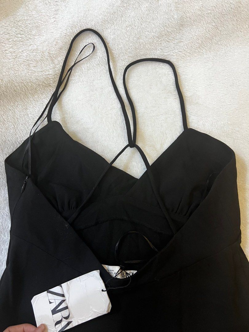 ZARA Surplice Black Dress (Category: Dresses) located in Quezon City. Submitted by ellastore (Listing ID 1359430743, Image 3). Description: BNWT Needs wash Medium to Large Runs big .