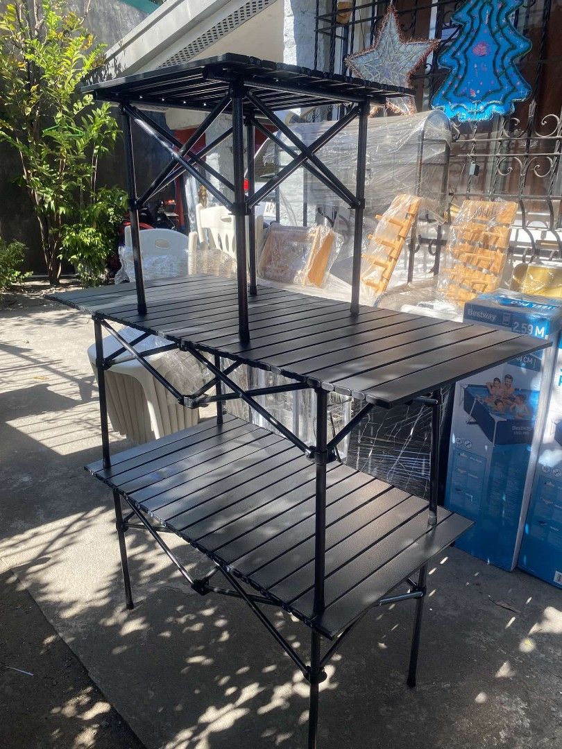 Camping table foldable (Category: Hiking & Camping) located in Manila. Submitted by dolorchris69891 (Listing ID 1359548771, Image 3). Description: Camping table foldable small 50cm - 700 black and khaki color medium 95cm - 850 black only large 120 cm - 950 black only.