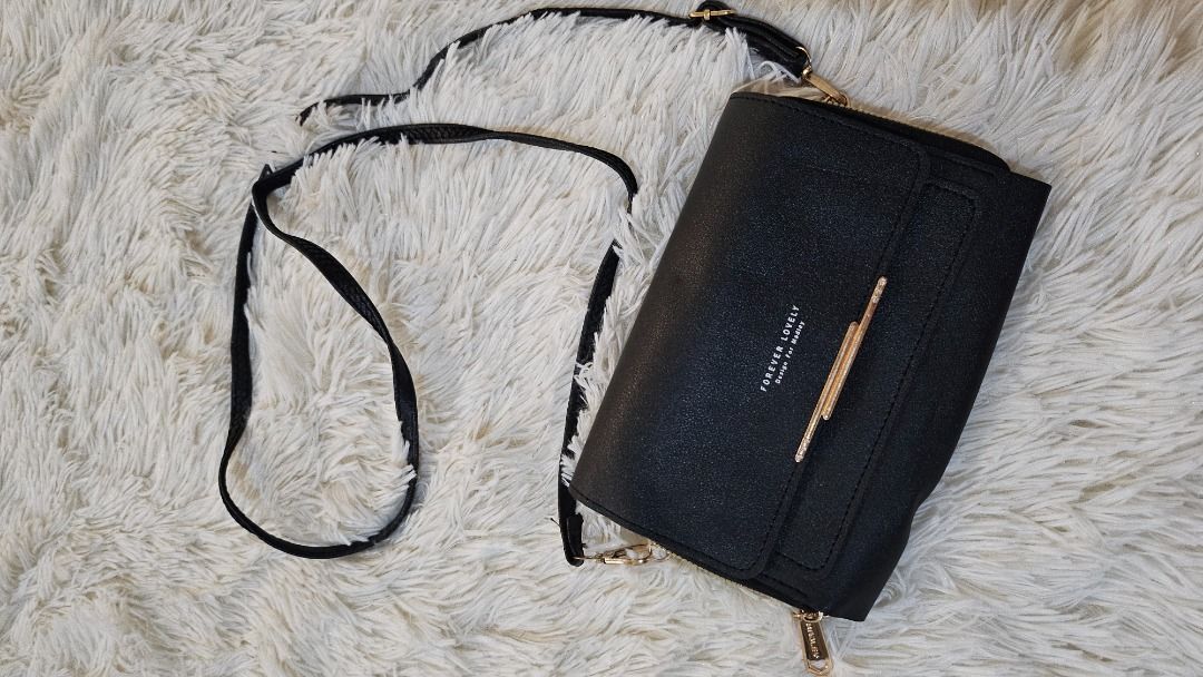 Forever Lovely Wallet sling bag (Category: Clutches) located in Cainta. Submitted by shop.katch (Listing ID 1359548260, Image 1). Description: .