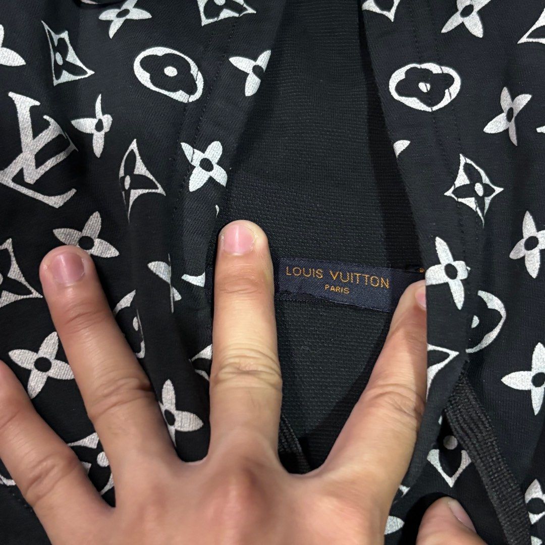 Louis Vuitton Monogram Hoodie (Category: Luxury Apparel) located in General Trias. Submitted by max_thrifted (Listing ID 1359624711, Image 3). Description: Louis Vuitton Monogram Hoodie Medium on tag Weight: 20 Length: 24 Excellent condition Issue just minimal pin hole on the back hood but not noticeable .
