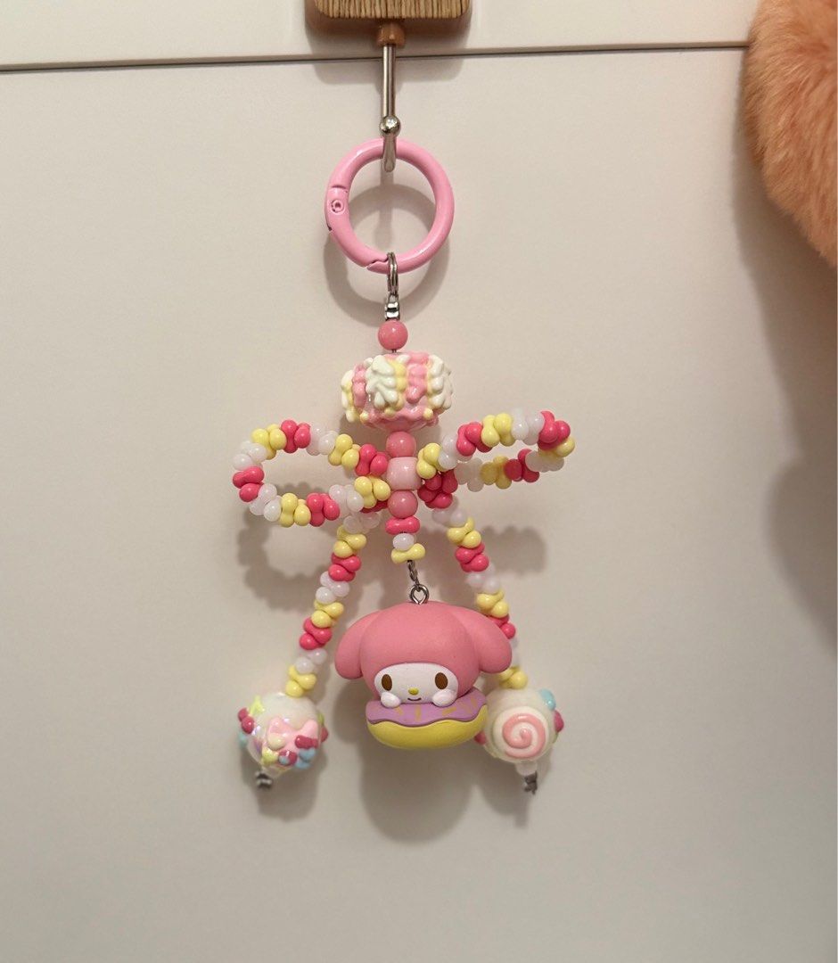 My Melody Phone Charm/Keychain (Category: Charms) located in Bulacan. Submitted by pamdcf (Listing ID 1359532685, Image 1). Description: Official My Melody with Hand painted & Peanut beads Comes with free phone tether tab Loc: bulacan Mod: jnt lalamove Mop: gcash.