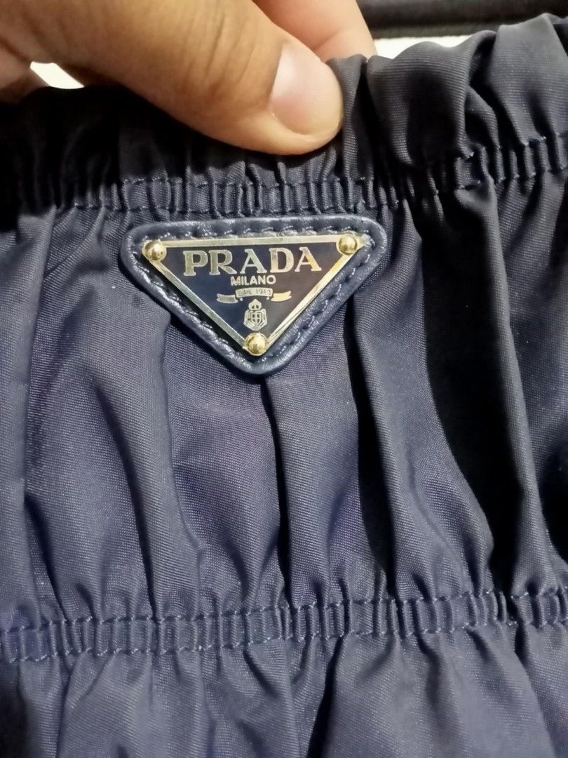 Prada (Category: Luxury Bags & Wallets) located in Bayombong. Submitted by kweeeen (Listing ID 1359598914, Image 3). Description: Prada Baltic Blue Tessuto Nylon Gauffre tote bag lampo zip slightly negotiable.