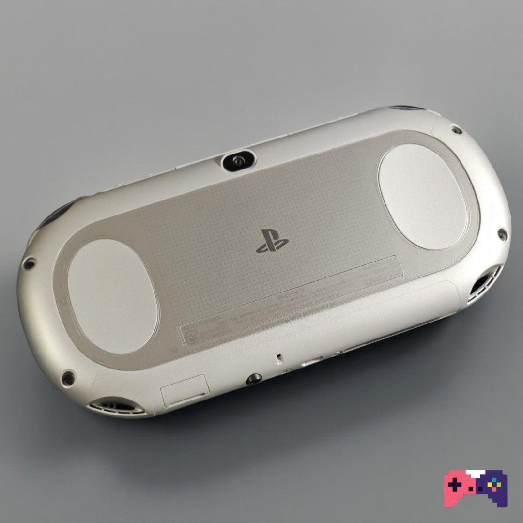 PS Vita Slim Silver (Rare) (Category: PlayStation) located in Paranaque City. Submitted by john020497 (Listing ID 1359577476, Image 2). Description: - Mint condition almost new. - With thumb grips, charger, 128gb sd2vita and bag. - Screen protected front and back. Bacoor, Cavite area. Delivery via Lalamove/Grab/JNT/LBC..