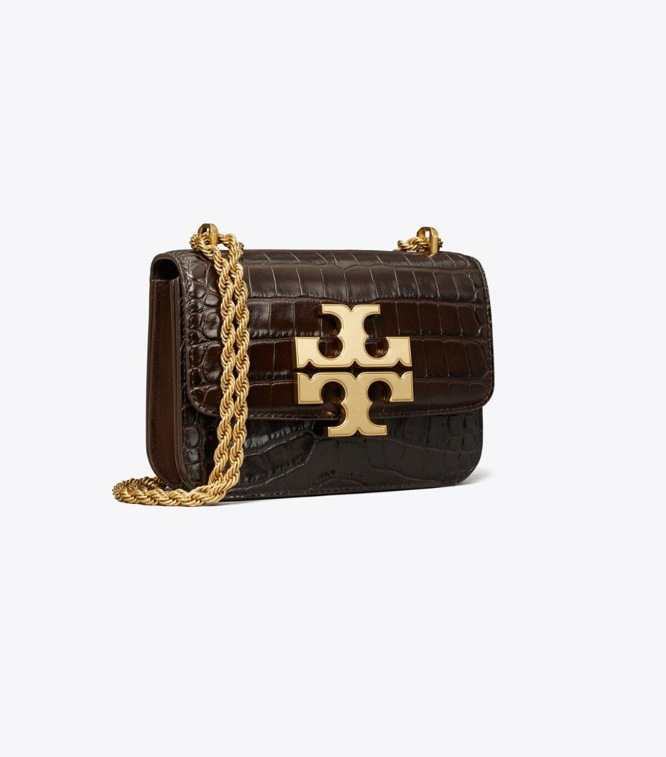 Tory Burch Small Eleanor Croc Embossed Bag (Category: Luxury Bags & Wallets) located in Manaoag. Submitted by dressupdear (Listing ID 1359657458, Image 2). Description: Authentic. Brand new with tag and dustbag. Bought from flashsaver at IG. rfs: i love the bag but I was never reaching for it to use. I prefer my gucci woc and longchamp mademoiselle. Richly textured embossed leather contrasted with smooth hardware, against the clean lines of a box