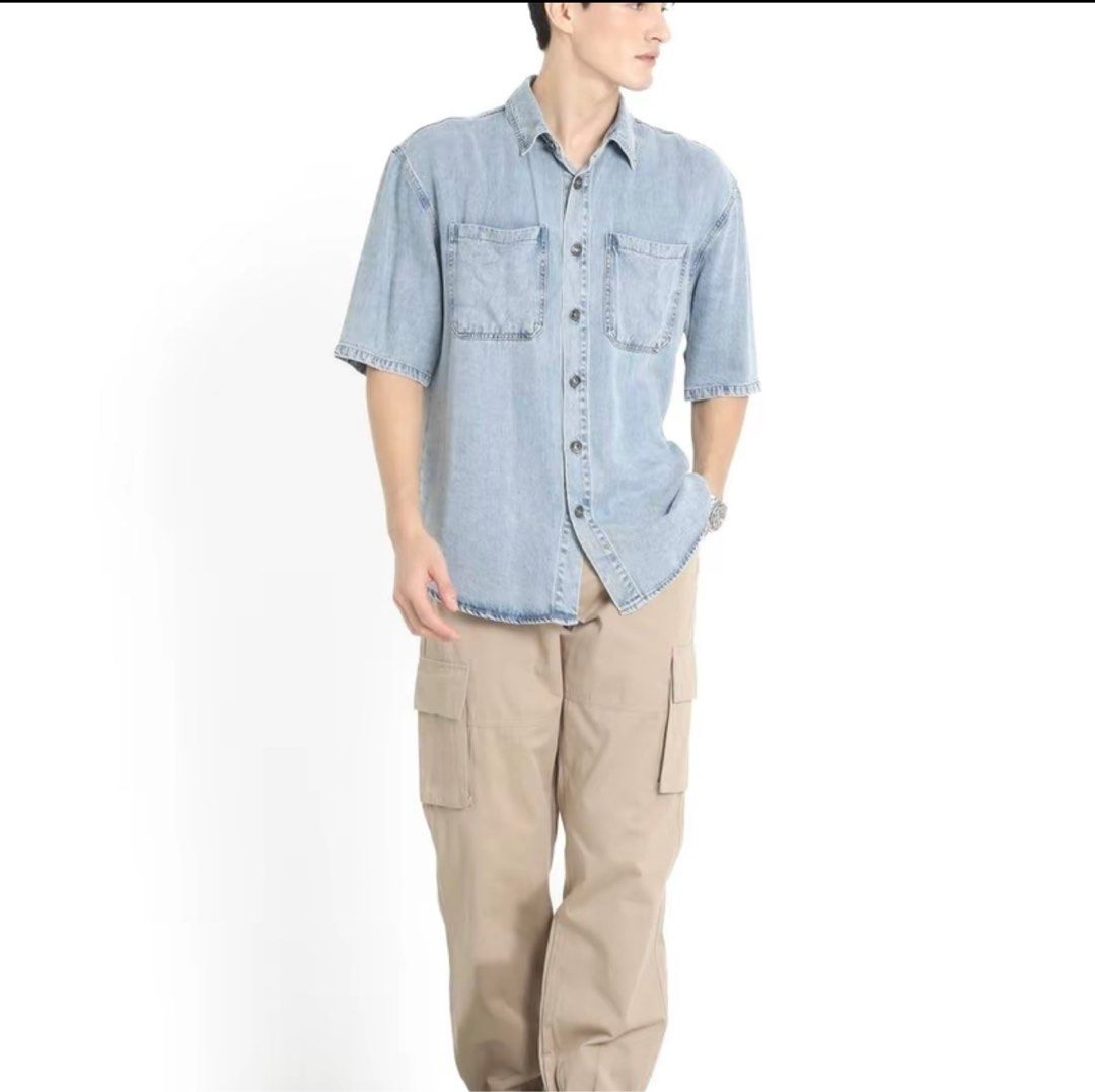 Topazette *TPZ* Vemy Unisex Tencel Denim Shirt in Light Wash (S) (Category: Shirts) located in Singapore. Submitted by fluff_bear (Listing ID 1359644822, Image 1). Description: BNWT Topazette Vemy Tencel Denim shirt in Light Wash- Size S Open to trade with size XS of the same color. See pic 2 for measurement chart. .