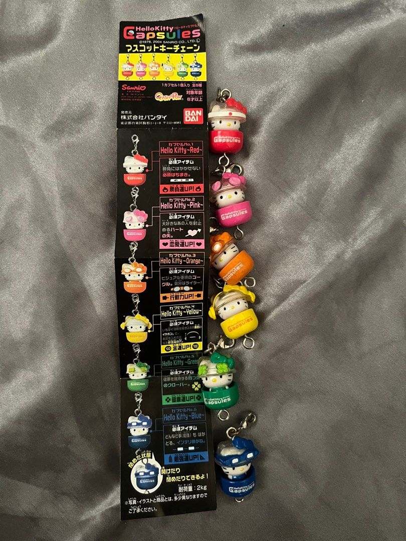 Bandai Hello Kitty Capsules 2004 (Category: Character Goods) located in Binan City. Submitted by tring_ (Listing ID 1359700916, Image 1). Description: Bandai Hello Kitty Capsules 2004 Opened: 2.3 x 1.5 cm Closed: 1.8 x 1.5 cm 6 pieces Orange and green has some dirt spots RFS: downsizing my collection Payment via Gcash Shipping is through J&T Express 🤍 .