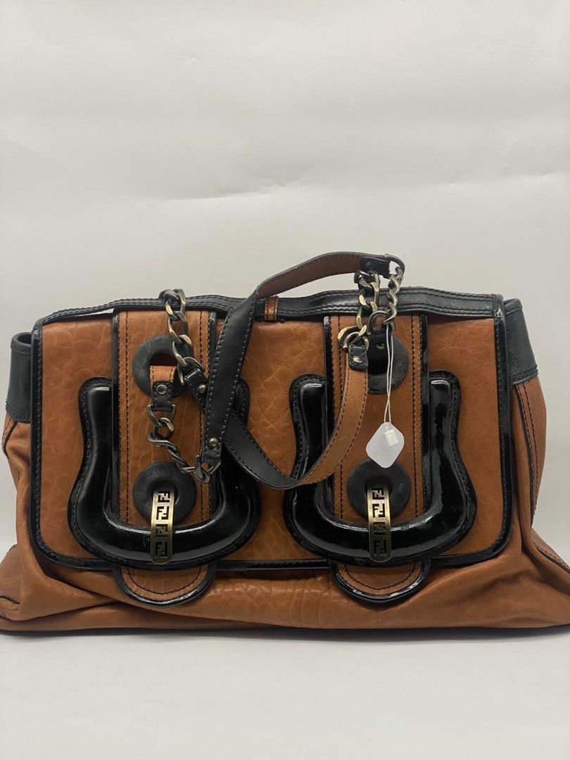 Fendi Handbag (Category: Luxury Bags & Wallets) located in Rizal. Submitted by loois18 (Listing ID 1359753136, Image 1). Description: Fendi Brown Leather Handbag. I’ll send more pictures upon request. .