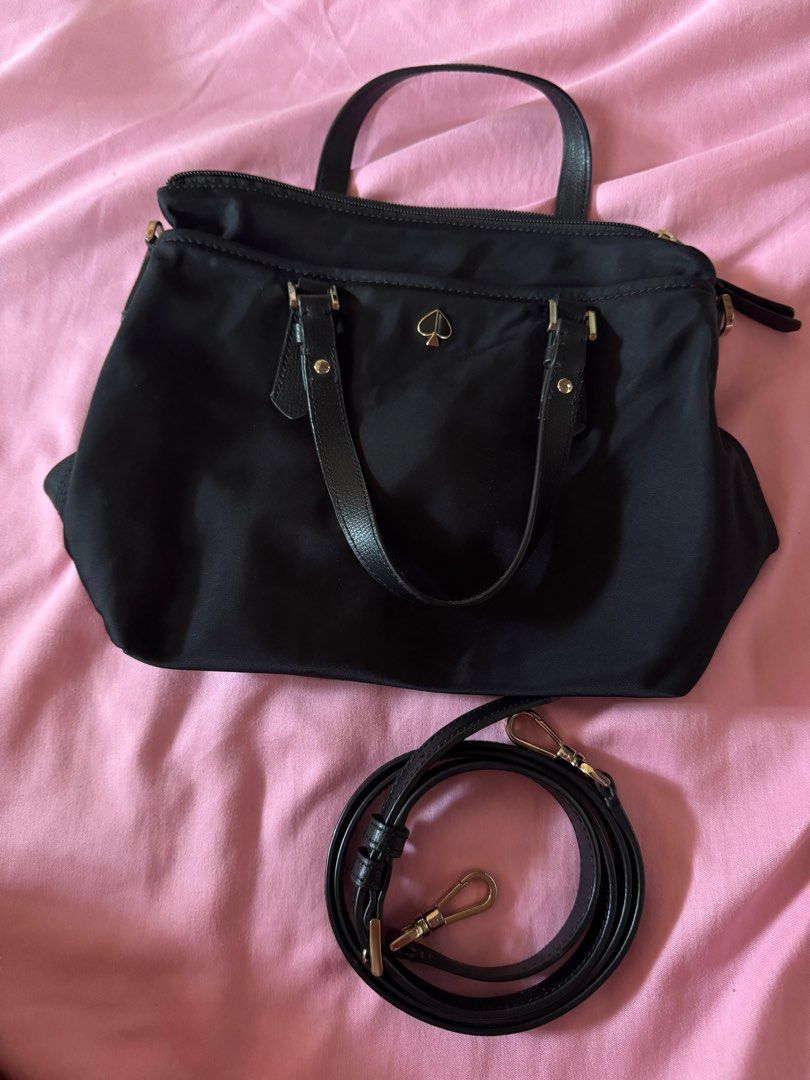 Kate Spade Nylon Sling Bag (Category: Luxury Bags & Wallets) located in Las Pinas. Submitted by sincerelyfel (Listing ID 1359704876, Image 3). Description: 8/10 condition Size: Small Model: Taylor Issue: loose thread/nawala tahi lang dun sa isang pocket. Pwede naman mapatahi RFS: hindi na nagagamit .