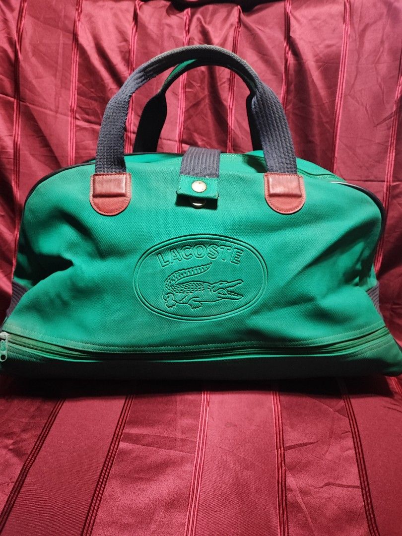 Lacoste vintage Traveling bag (Category: Luxury Bags & Wallets) located in Baguio. Submitted by ozara.06 (Listing ID 1359756478, Image 1). Description: Lacoste vintage Traveling bag Malaki ito Kasya pang 1 week na gamit May minimal flaw sa pipe 2k.