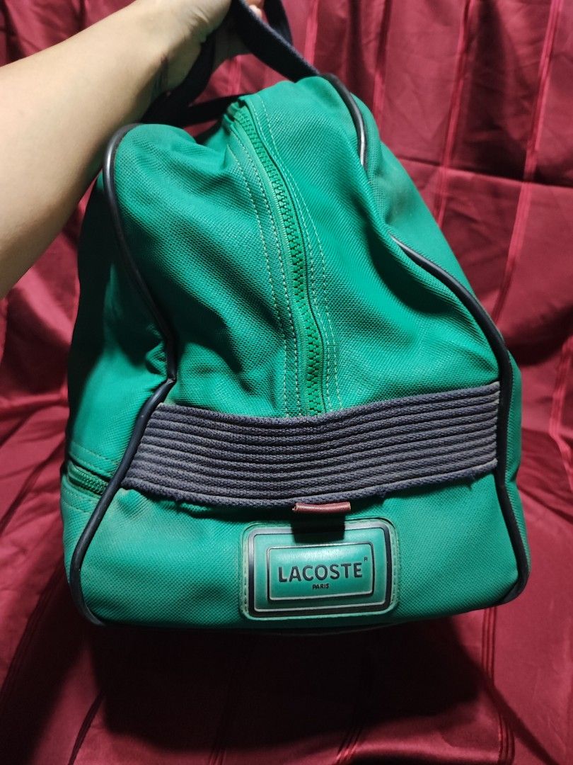 Lacoste vintage Traveling bag (Category: Luxury Bags & Wallets) located in Baguio. Submitted by ozara.06 (Listing ID 1359756478, Image 2). Description: Lacoste vintage Traveling bag Malaki ito Kasya pang 1 week na gamit May minimal flaw sa pipe 2k.