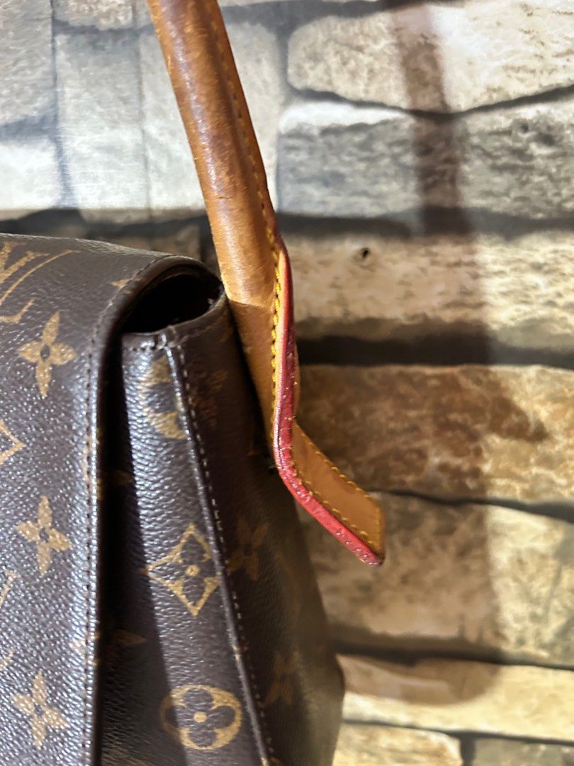 LV vintage Mini looping shoulder Bag (Category: Luxury Bags & Wallets) located in Manila. Submitted by cfsg061214 (Listing ID 1359704827, Image 3). Description: See pics for flaws (vintage look) Genuine leather .