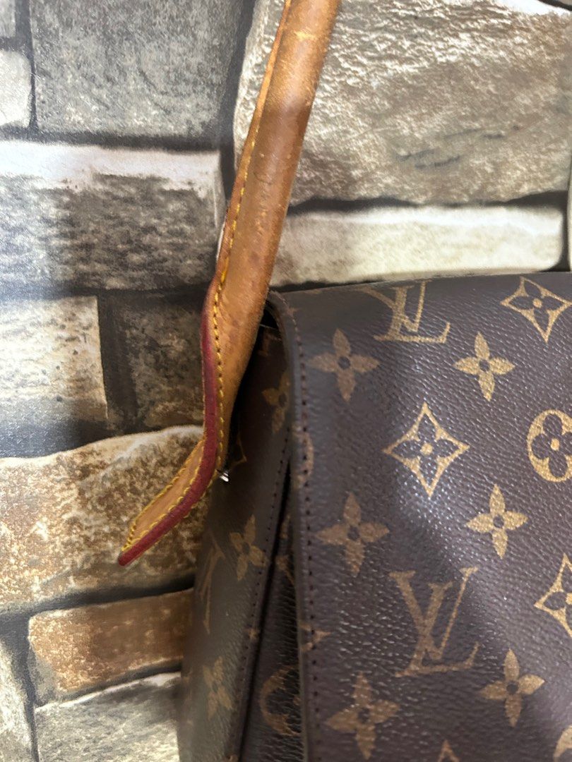 LV vintage Mini looping shoulder Bag (Category: Luxury Bags & Wallets) located in Manila. Submitted by cfsg061214 (Listing ID 1359704827, Image 2). Description: See pics for flaws (vintage look) Genuine leather .