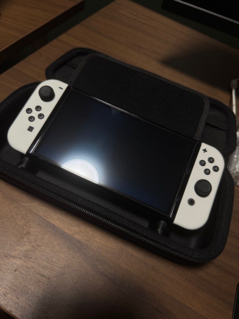 Nintendo Switch OLED (Category: Nintendo) located in Manila. Submitted by joeymacapa31535 (Listing ID 1359764631, Image 3). Description: Selling Nintendo Switch OLED Complete set w/ Box Good as new Included Skull n co Case Skull n co grip Tempered glass Legend of zelda Tears of the kingdom Just dance 2022/2023 13k Rfs: Busy sa work Meetup Loc: Pasig/Cainta/Marikina.