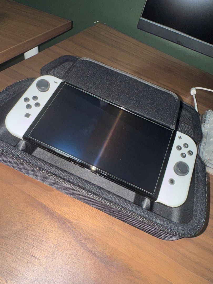 Nintendo Switch OLED (Category: Nintendo) located in Manila. Submitted by joeymacapa31535 (Listing ID 1359764631, Image 2). Description: Selling Nintendo Switch OLED Complete set w/ Box Good as new Included Skull n co Case Skull n co grip Tempered glass Legend of zelda Tears of the kingdom Just dance 2022/2023 13k Rfs: Busy sa work Meetup Loc: Pasig/Cainta/Marikina.