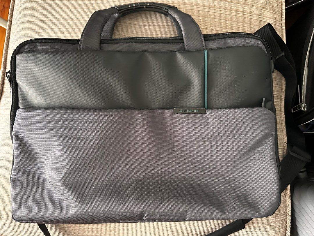 SAMSONITE LAPTOP BAG (Category: Laptop Bags & Sleeves) located in Taguig. Submitted by pinkpanther1 (Listing ID 1359708180, Image 1). Description: AUTHENTIC SAMSONITE LAPTOP BAG -can fit 2 laptops and an ipad - has alot of pockets inside -with original sling Flaw- leather handle has signs of wear and cracks -can fit 15-inch laptop Lalamove fee from bgc - c/o buyer .