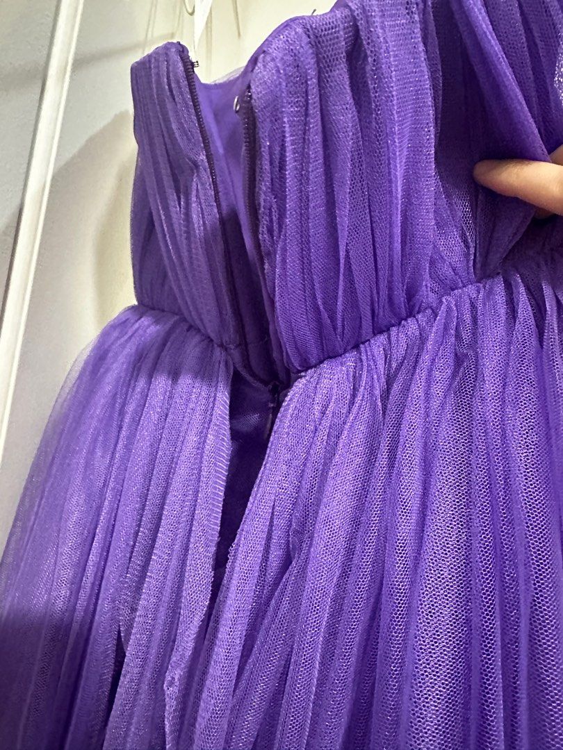 Purple tulle dress (Category: Evening dresses & gowns) located in Quezon City. Submitted by declutter___mnl (Listing ID 1359752370, Image 2). Description: Never used Measurements Bust 29” Waist 24” Comes with another layer of skirt para mukhang mahaba! Selling low Perfect for prom.