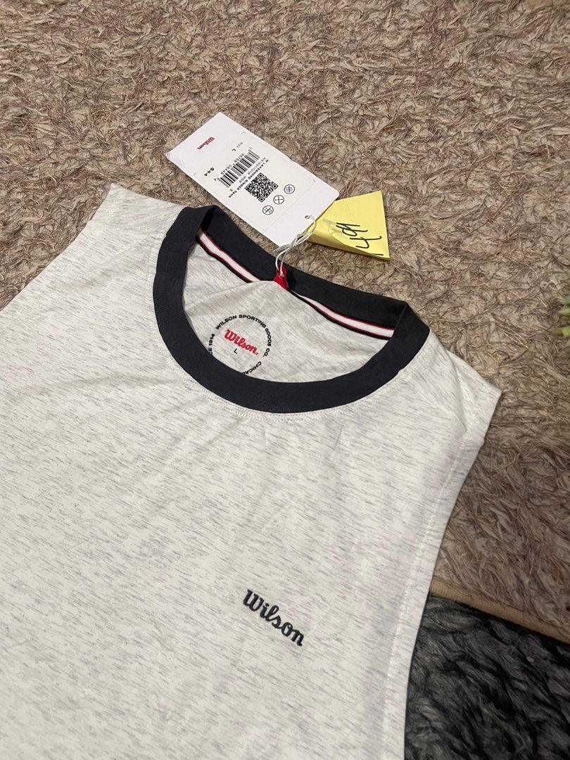 Wilson tanktop (Category: Activewear) located in Las Pinas. Submitted by moncaz2461827 (Listing ID 1359758742, Image 2). Description: Wilson tanktop Size large on tag Dimes 20x27.5 Good as brandnew (with hangtag) Color rate 10/10 Issue; very light color transfer hindi halata Mine380+sf.