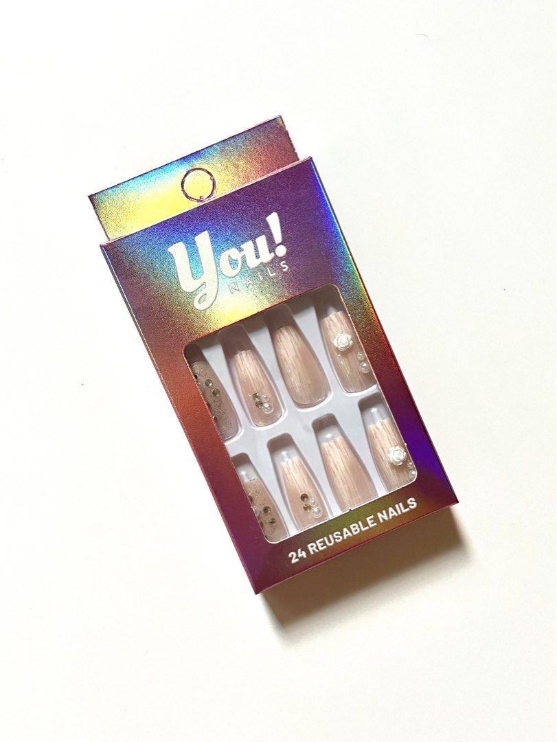(2 for p250) Bridal Neutral Press on Nails (Category: Hands & Nails) located in Quezon City. Submitted by sam.kim (Listing ID 1359978302, Image 2). Description: You! Nails press-on nails - High-quality ABS acrylic - Reusable - Easy-to-use and remove - Different nail sizes What you get: - 24 pieces press-on acrylic nails - 1 wooden stick - 1 nail file How to apply: 1. Clean and trim nails. 2. Choose the right size of press-on nails. 3. If using na