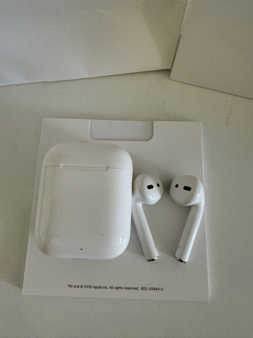 Authentic Apple AirPods (Category: Earphones) located in Cavite. Submitted by preloved_mommyandkidsph (Listing ID 1359930372, Image 2). Description: Full set box, manual paper bag without the cable In great condition With free rubber casing Bought in Changi Airport Singapore .