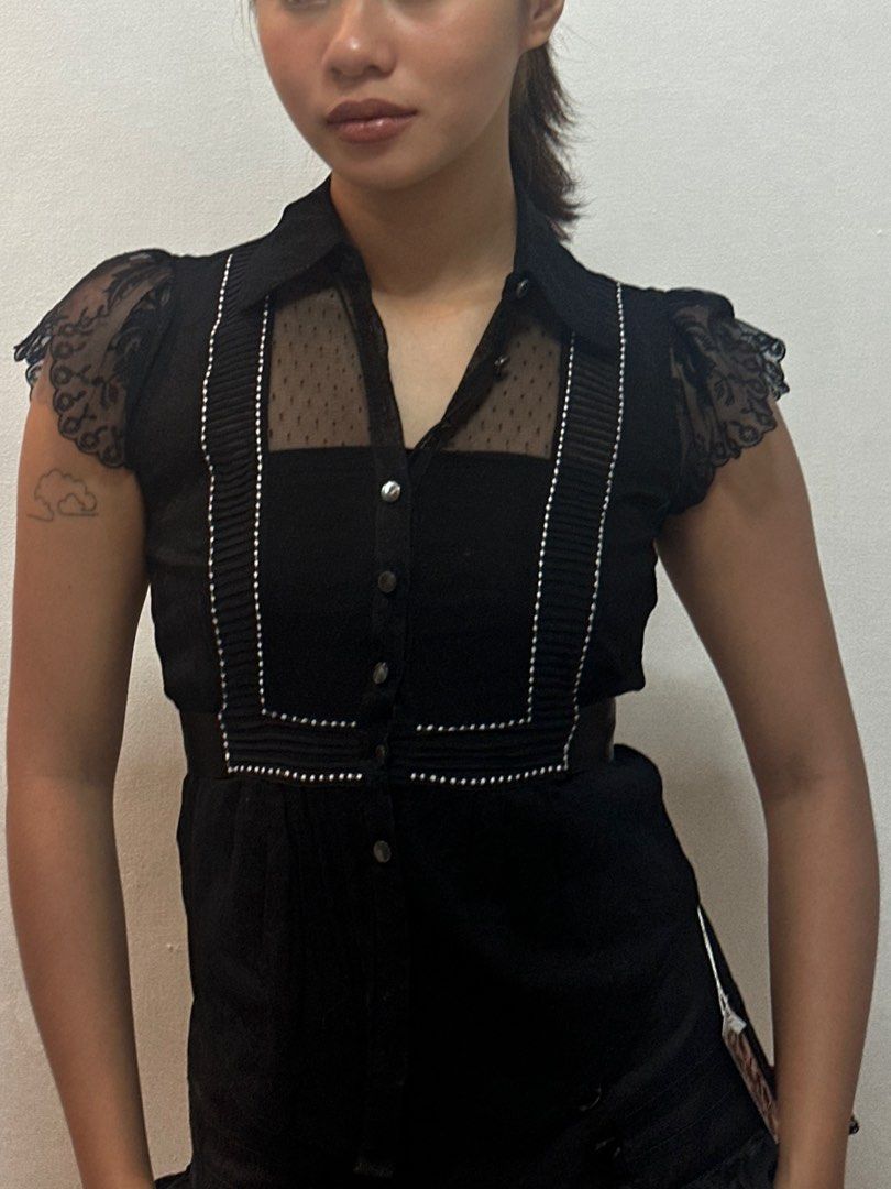 black mesh ruffled sleeves top (Category: Blouses) located in Quezon City. Submitted by charief (Listing ID 1359910070, Image 2). Description: see through, xs-m size .