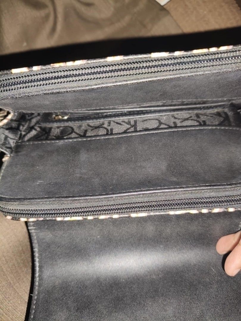 Calvin Klein Signature Mini Backpack | Khaki Black (Category: Luxury Bags & Wallets) located in Manila. Submitted by weya_ (Listing ID 1359911690, Image 3). Description: issue: has cat scratches (see pic) needs a lil bit of cleaning negotiable.