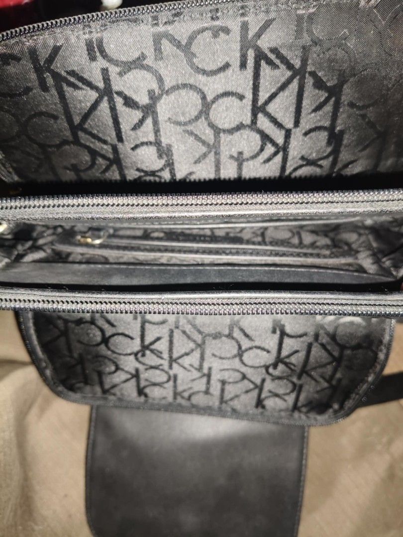 Calvin Klein Signature Mini Backpack | Khaki Black (Category: Luxury Bags & Wallets) located in Manila. Submitted by weya_ (Listing ID 1359911690, Image 2). Description: issue: has cat scratches (see pic) needs a lil bit of cleaning negotiable.