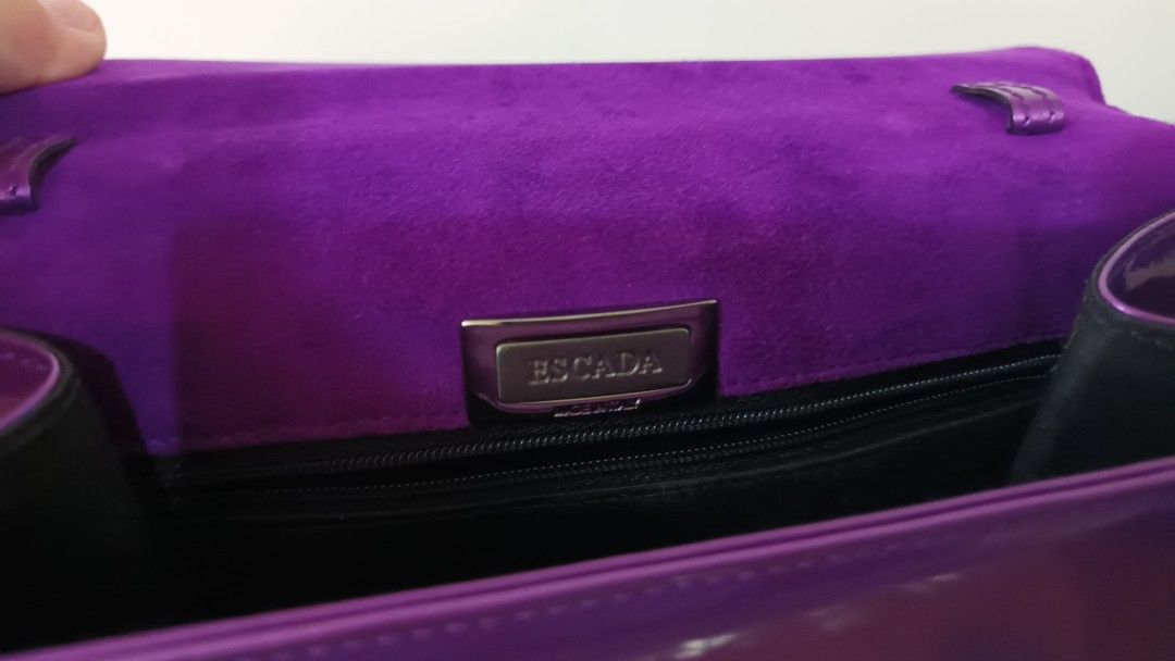 ESCADA Vintage Top Handle Bag Purple (Category: Luxury Bags & Wallets) located in Makati City. Submitted by Tins_Haven (Listing ID 1315791876, Image 3). Description: ESCADA top handle Bag vinrage Purple Pre-loved.