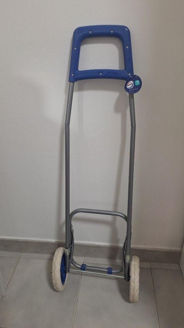 Foldable Trolley (Category: Travel Essentials & Accessories) located in Singapore. Submitted by flowergirl2018 (Listing ID 1359856021, Image 1). Description: condition is still pristine..