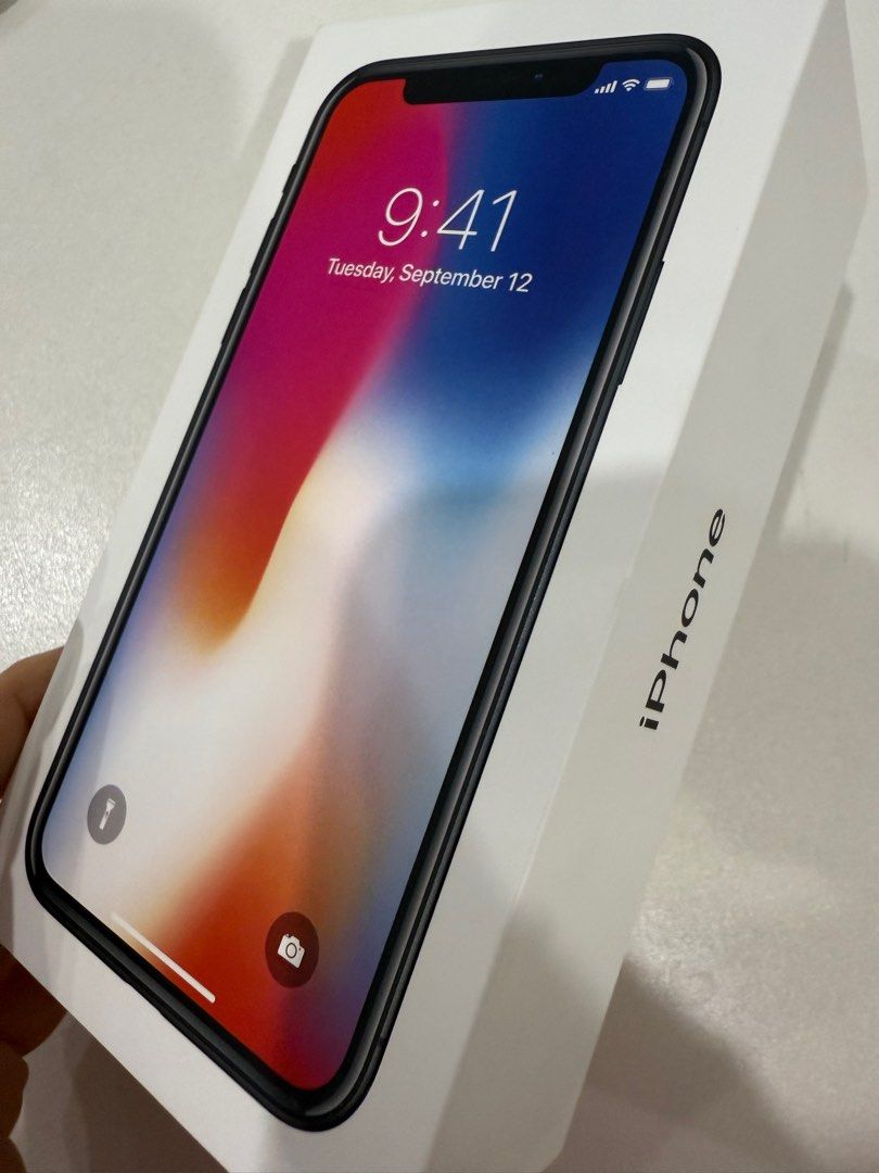 iPhone X 256GB Factory Unlocked (Category: iPhone X Series) located in Quezon City. Submitted by 18john (Listing ID 1360025753, Image 1). Description: 256GB Unlocked Unit in Box Model M -bought new , 1st owner No dents, minimal signs of usage All original parts - Battery health 67% Phone and box only .