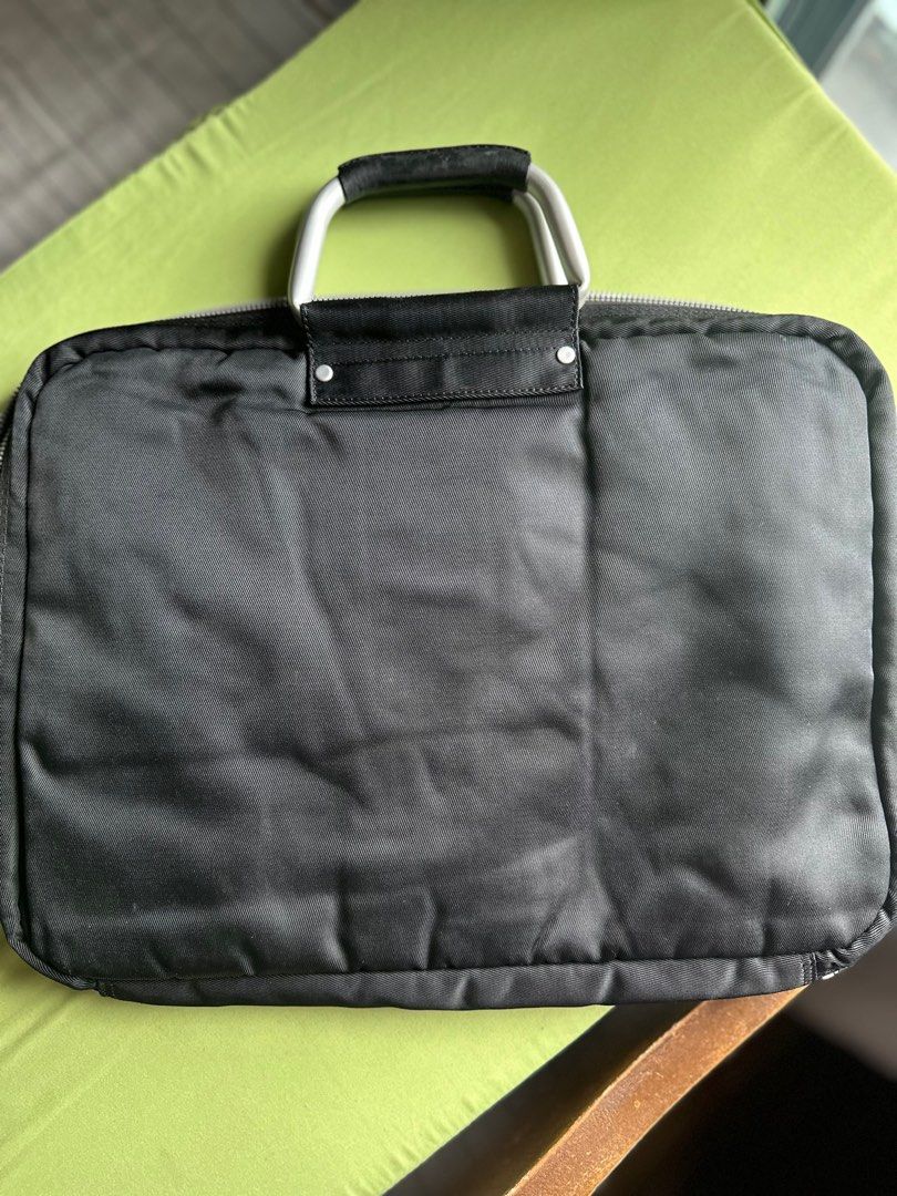 Laptop or Documents Bag (Category: Laptop Bags & Sleeves) located in Mandaluyong City. Submitted by TheWeekendProject (Listing ID 1359931071, Image 2). Description: Black padded nylon laptop or documents bag. Lots of compartment. No issues. .