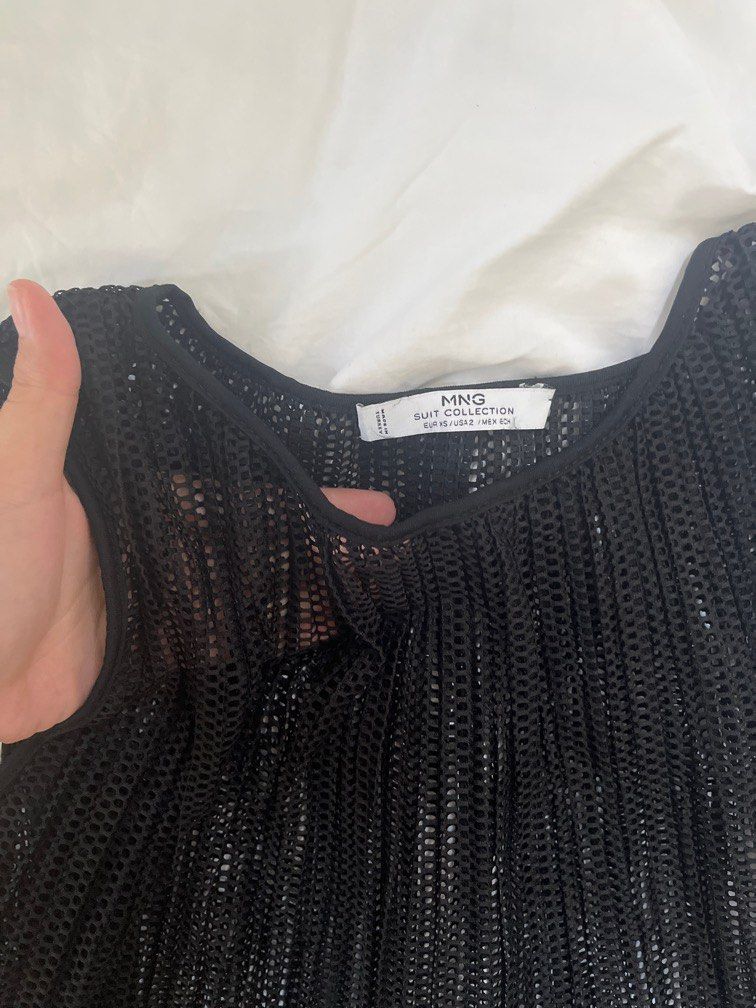 Mango Suit Black Sheer Sleeveless Top (US2-US4) (Category: Sleeveless) located in Manila. Submitted by sofiaalte (Listing ID 1359879524, Image 2). Description: Love this top SO high quality. Wear tank top or whatever under. US2 on tag but can fit me US4. Mango suit is very high quality. .