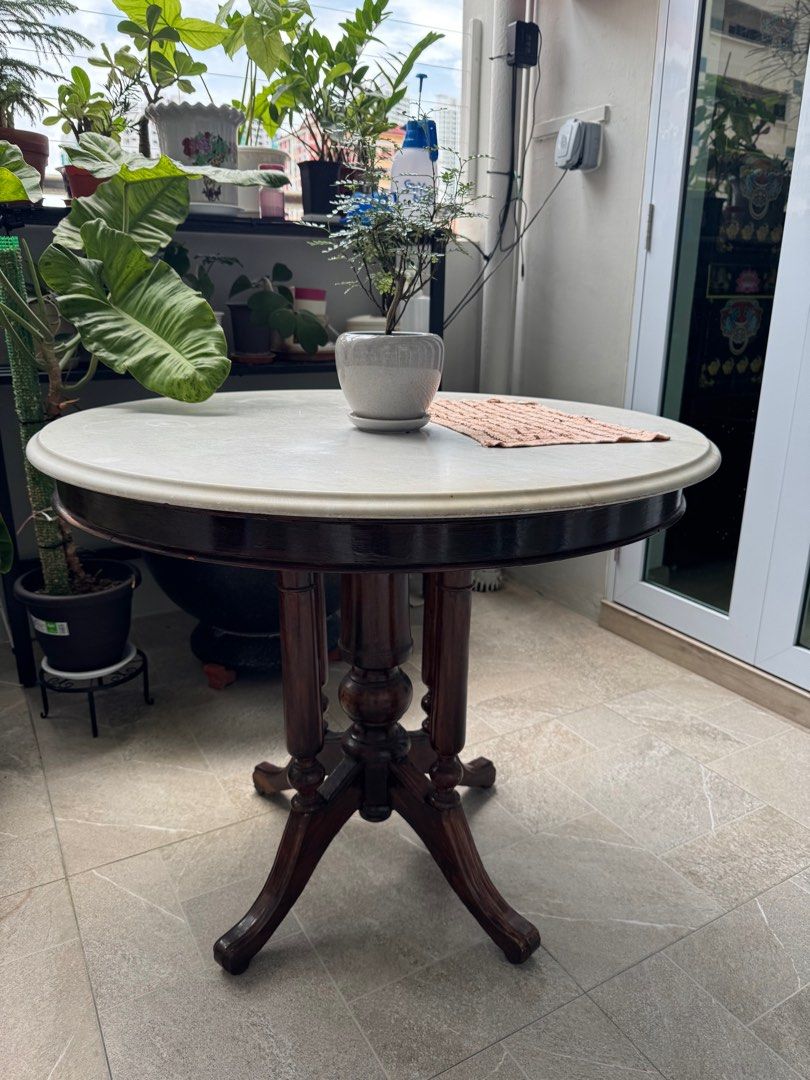 Marble table (Category: Tables & Sets) located in Singapore. Submitted by sun_shine26 (Listing ID 1359901142, Image 1). Description: Self collect at Bishan. Arrange own pick up Price negotiable Height is 77cm The diameter is 93cm .