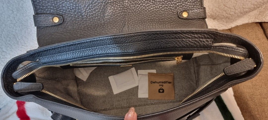 MCM Milla leather 2-way bag (Category: Luxury Bags & Wallets) located in Quezon City. Submitted by kishey (Listing ID 1359998855, Image 2). Description: with authenticity card price drop - moving out sale.