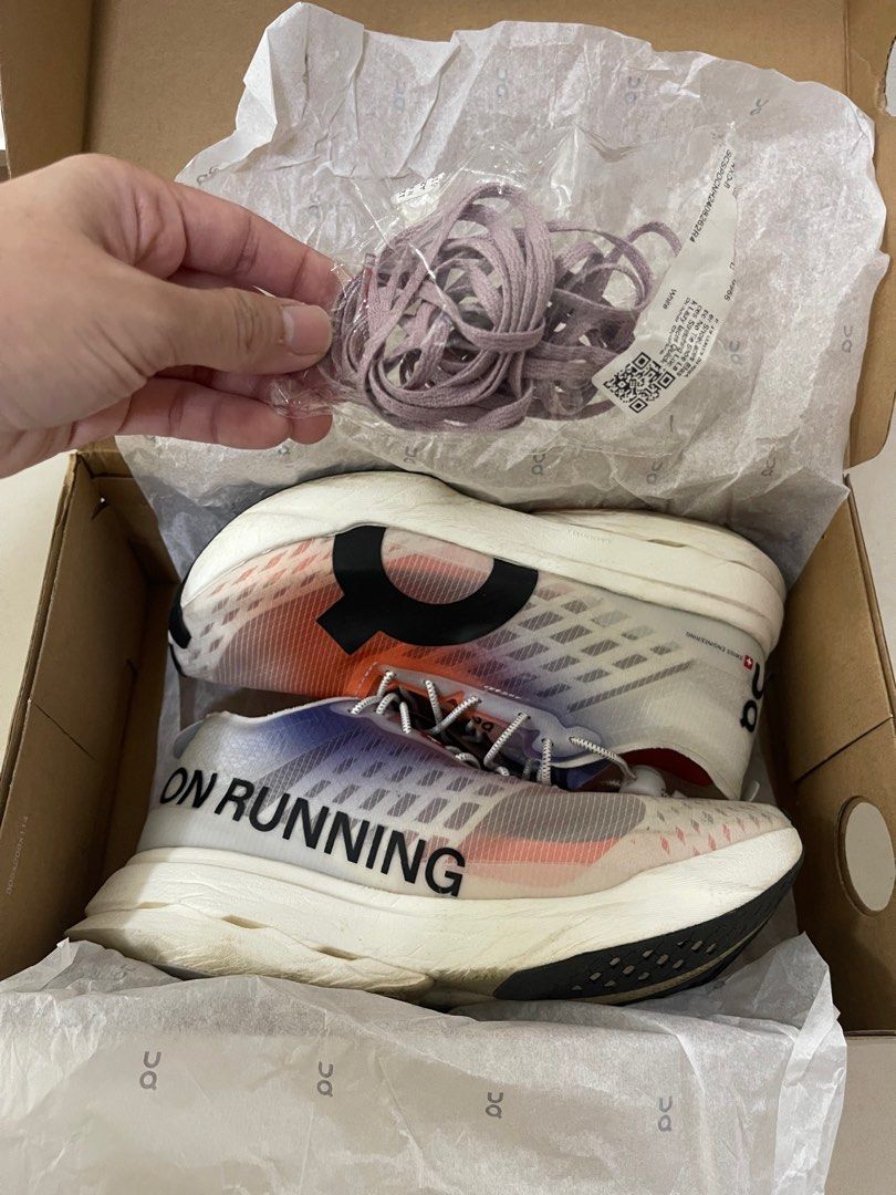 On Cloudboom Strike (Women’s - US 7/24cm) (Category: Sneakers) located in Pasig City. Submitted by k.torres (Listing ID 1359969996, Image 3). Description: On Cloudboom Strike (Women’s - US 7/24cm) Size: 24cm / US 7 Mileage: 100km Original Price: ₱ 15,390 Color: white/flame RFS: need to size up Original laces included (easy/no tie shoe lace can be removed) Built for marathons. Race-day ready. This road runner is ultra-responsive, ultra-cushioned a