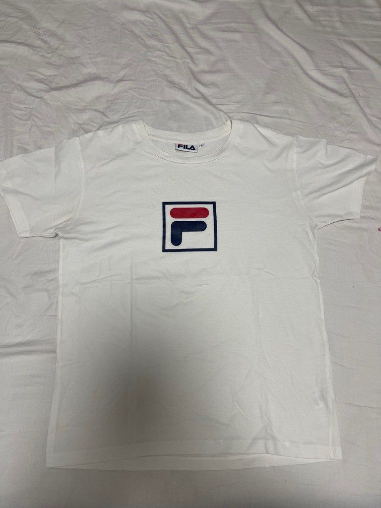 original fila logo white tee (Category: Shirts) located in Quezon City. Submitted by squidsells (Listing ID 1360007191, Image 1). Description: size: m mop: gcash/maya/bpi mod: same day delivery or j&t.