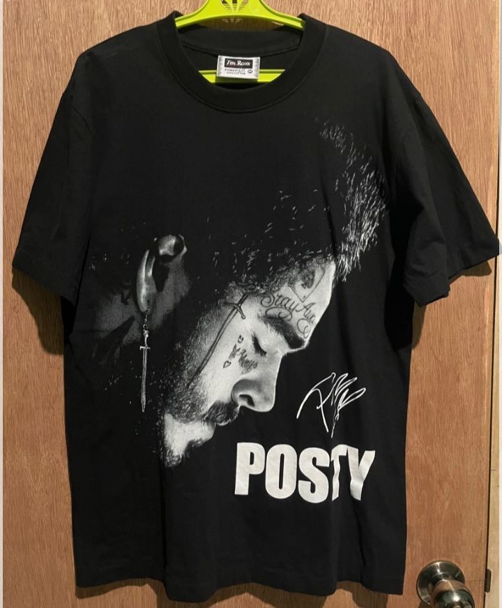 Post Malone shirt (Category: Tshirts & Polo Shirts ) located in Makati City. Submitted by decluttering143 (Listing ID 1360034489, Image 1). Description: Medium width 20 Length 27 Sleeve 9 (inches) Slightly used No defects Made in Thailand + shipping fee.