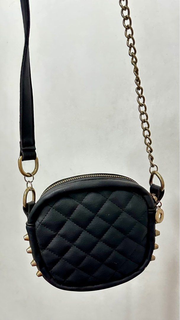 Pre-loved Black Studded Bag (Category: Cross-body Bags) located in Quezon City. Submitted by trishystuff (Listing ID 1359940238, Image 2). Description: Disclaimer: - Color might be slightly different from actual due to camera/screen settings. - Please see photos for flaws. Mode of payment: Bank transfer or Gcash Note: Shipping via Grab or Lalamove ONLY. Fee care of buyer..