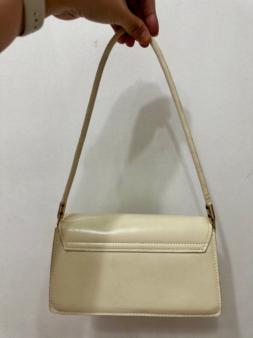 Pre-loved Shein Off White Shoulder Bag (Category: Purses & Pouches) located in Quezon City. Submitted by trishystuff (Listing ID 1359933745, Image 2). Description: Disclaimer: - Color might be slightly different from actual due to camera/screen settings. - Please see photos for flaws. Mode of payment: Bank transfer or Gcash Note: Shipping via Grab or Lalamove ONLY. Fee care of buyer..