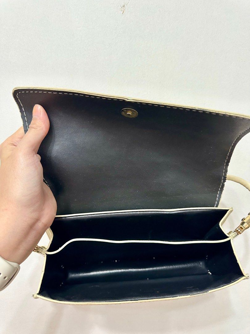 Pre-loved Shein Off White Shoulder Bag (Category: Purses & Pouches) located in Quezon City. Submitted by trishystuff (Listing ID 1359933745, Image 3). Description: Disclaimer: - Color might be slightly different from actual due to camera/screen settings. - Please see photos for flaws. Mode of payment: Bank transfer or Gcash Note: Shipping via Grab or Lalamove ONLY. Fee care of buyer..