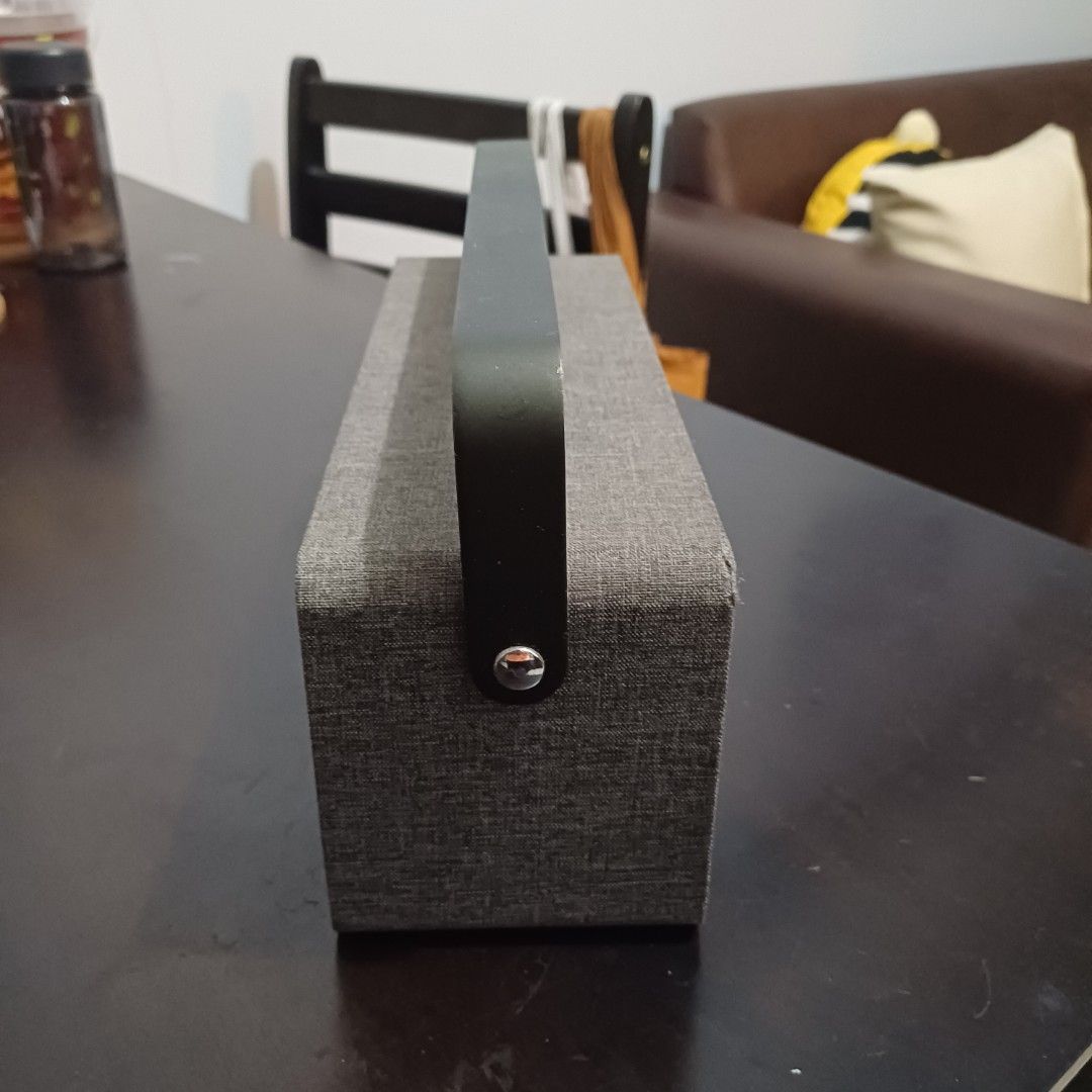 Retro Portable Bluetooth Speaker (Category: Portable Audio Accessories) located in Quezon City. Submitted by bikenbake (Listing ID 1359985807, Image 2). Description: Grey and black bluetooth speaker. Micro-USB charging port..
