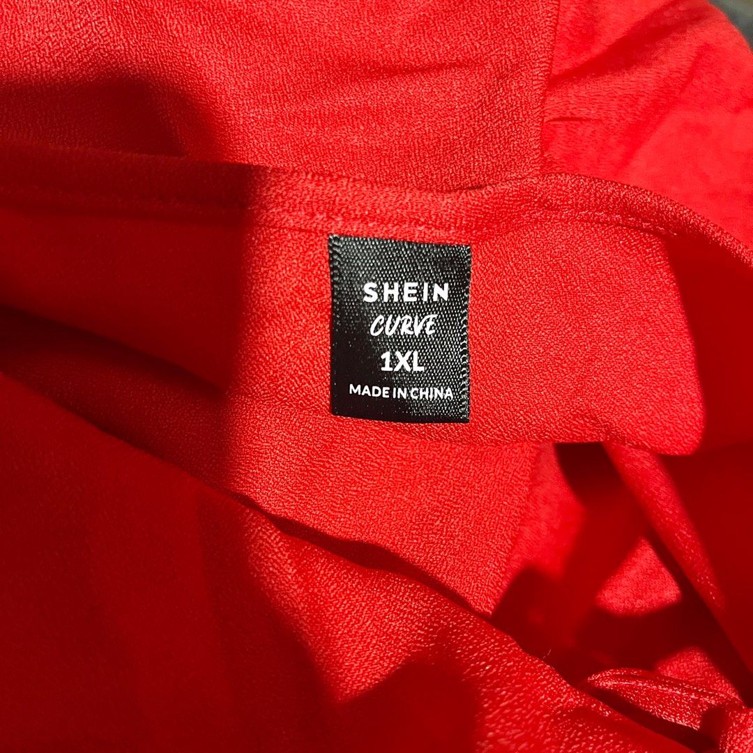 Shein Curve Red Top - 1XL (Category: Blouses) located in Marikina City. Submitted by maya.declutters (Listing ID 1359899813, Image 2). Description: - Shein Curve - 1XL on tag PERSONAL ITEMS / NOT FROM UKAY MOP: GCash / Bank Transfer Delivery: - Lalamove (7PM onwards) - J&T - Shipping fee will be shouldered by the buyer Can also do meetups around Marikina for purchases P1000 & up 🙂.