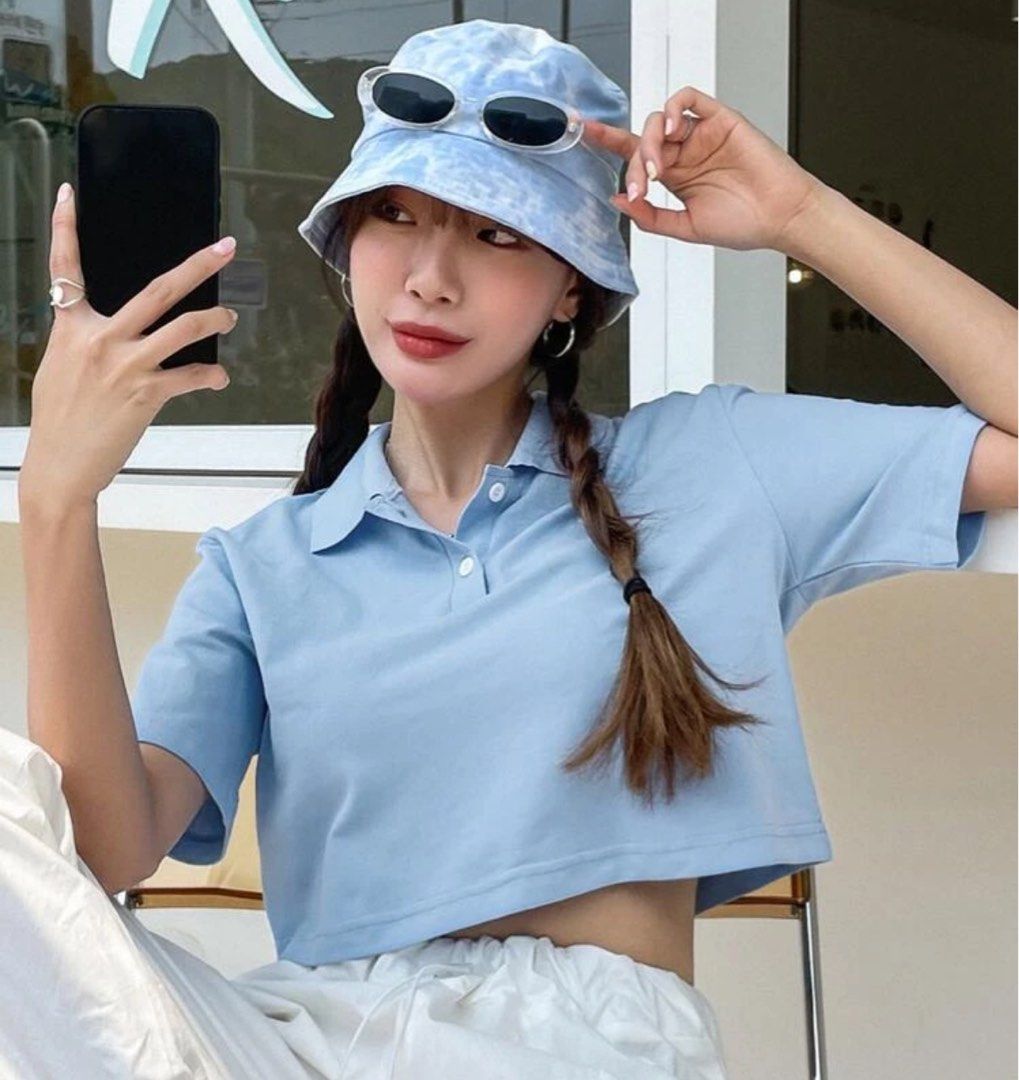 Solid button front crop tee blue (Category: Blouses) located in Singapore. Submitted by landowecanbeworldchamp (Listing ID 1359923005, Image 1). Description: DAZY size M Crop polo tee Polo T shirt .