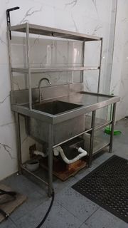 Stainless steel sink with shelves
