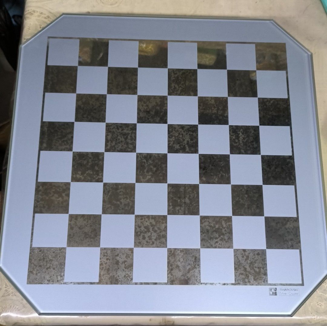 Swarovski chess silver crystal board only (Category: Board Games & Puzzles) located in Taytay. Submitted by ddxdd (Listing ID 1320834968, Image 1). Description: size chess area 11 x 11 inches plus 1 1/4 inch sa sides, squares around 1 x 1 inches, no chips, with original box. board only, no chess pieces. photos with reflections, last picture reference only.
